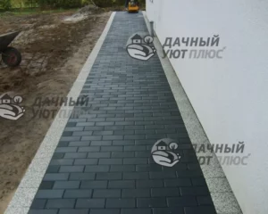 Мощение отмостки тротуарной плиткой