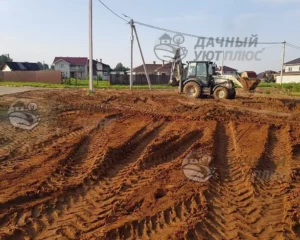 Процесс распределения планировочного грунта