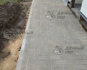 укладка плитки по периметру дома